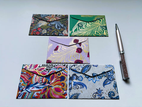Intricate flora and fauna with gold specks money envelopes for CNY, Eid and Christmas