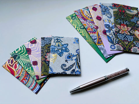 Intricate flora and fauna with gold specks money envelopes for CNY, Eid and Christmas