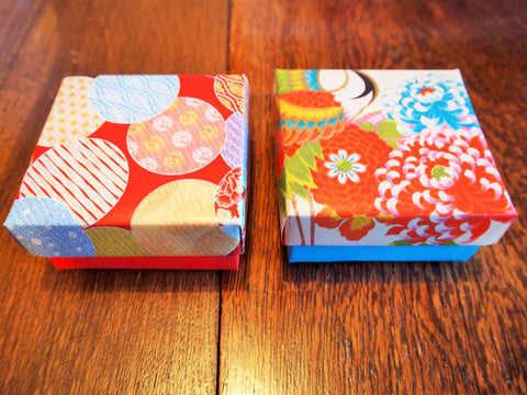 Red and blue floral gift box with lid