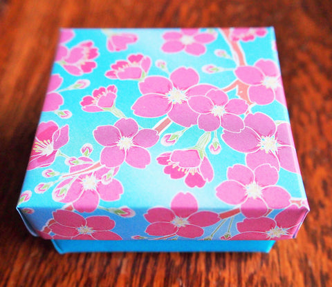 Blue and pink cherry blossom origami gift box with lid