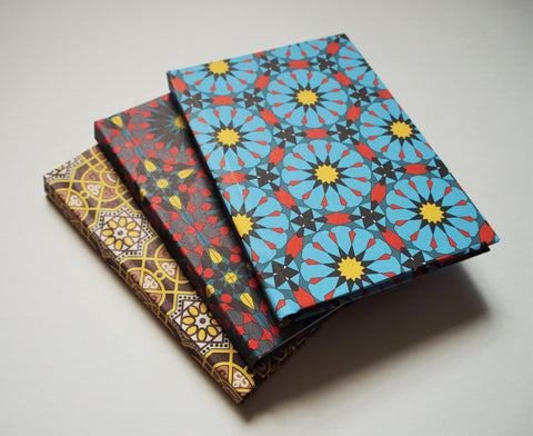 Arabian geometric hand-bound journals in A6 size with coptic stitch binding in 3 colours