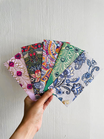 Intricate flora and fauna with gold specks money envelopes for CNY, Eid and Christmas