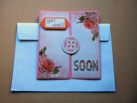 Get Well Soon gatefold card in pink, white and orange with floral decorations