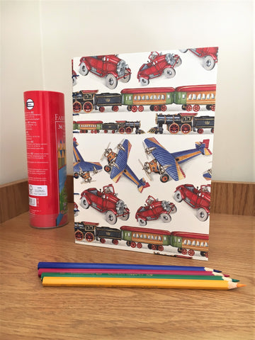 Children's hand-bound travel journal with exclusively designed activity pages in colour and a visible coptic stitch