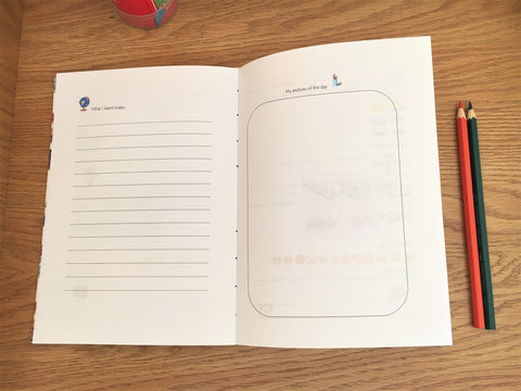 Children's hand-bound travel journal with exclusively designed activity pages in colour and a visible coptic stitch
