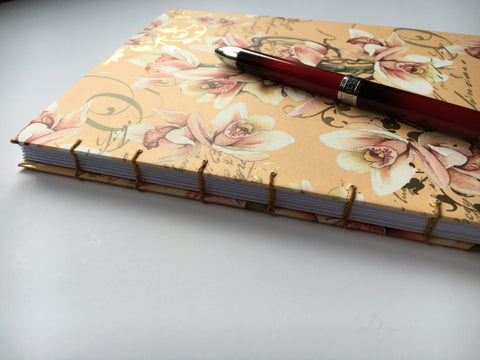 Handmade journals with beautiful exposed coptic stitch binding and blank inner pages