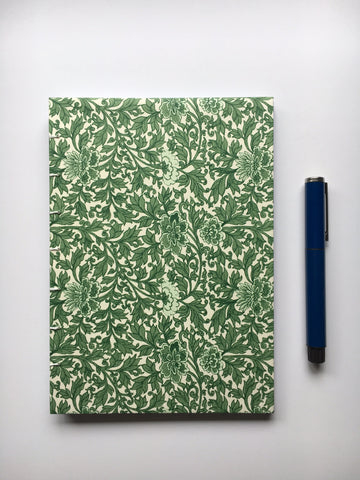 Handmade journals with beautiful exposed coptic stitch binding and blank inner pages