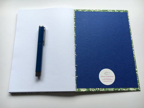 Handmade journals with beautiful exposed coptic stitch binding and blank inner pages