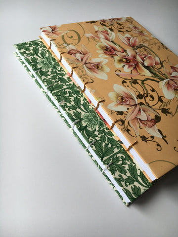 Handmade journals with beautiful exposed coptic stitch binding and blank inner pages