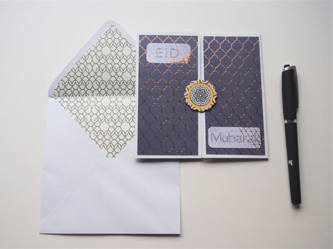 Purple gatefold Eid Mubarak card with gold touches