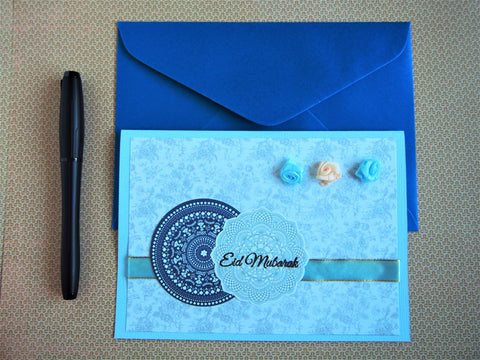 Eid Mubarak stamped greeting card in light blue