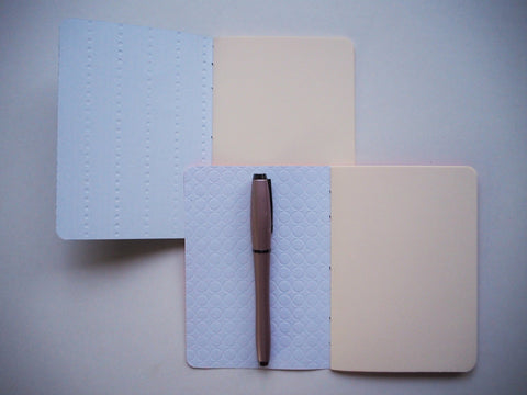 Blue and orange embossed hand-bound notebooks--set of 2