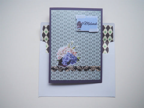 Silver Eid Mubarak handmade card on purple with floral detail and matching lined envelope