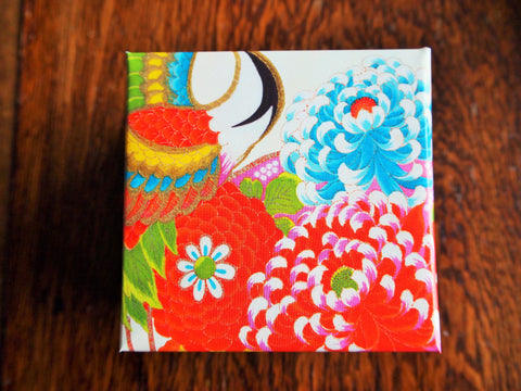 Red and blue floral gift box with lid