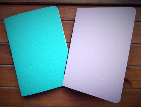 Turquoise and pastel pink embossed hand-bound notebooks--set of 2