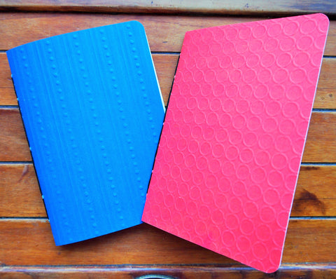 Blue and orange embossed hand-bound notebooks--set of 2