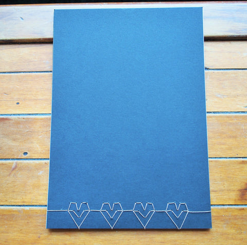 Japanese stab binding notebooks with unique hand-bound decorative designs: Arrows, Hearts, Chevron