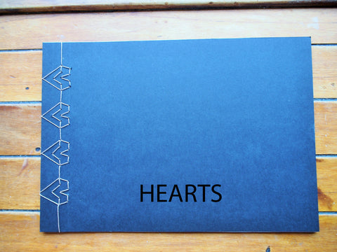 Japanese stab binding notebooks with unique hand-bound decorative designs: Arrows, Hearts, Chevron