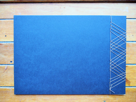 Japanese stab binding notebooks with unique hand-bound decorative designs: Stars, Marionette, Kissing fish, Maple leaves