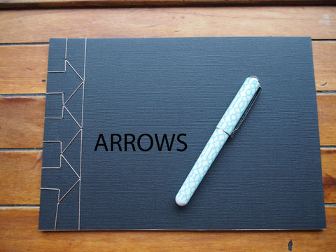 Japanese stab binding notebooks with unique hand-bound decorative designs: Arrows, Hearts, Chevron