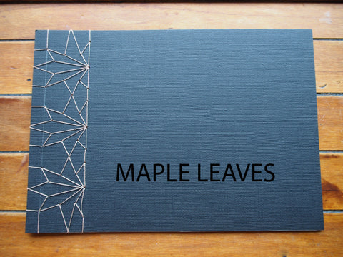 Japanese stab binding notebooks with unique hand-bound decorative designs: Stars, Marionette, Kissing fish, Maple leaves
