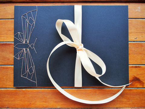 Japanese stab-binding notebooks with unique hand-bound decorative designs: Butterfly, Lotus blossom, Woven