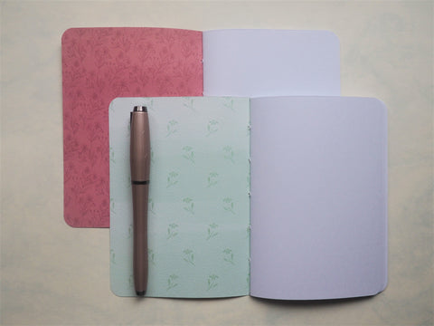 Elegant purple and pink florals on white--set of 2 handbound notebooks for Christmas