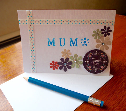 White and blue 'Thank You' stenciled Mother's Day card with flowers and pearls