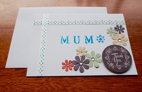 White and blue 'Thank You' stenciled Mother's Day card with flowers and pearls